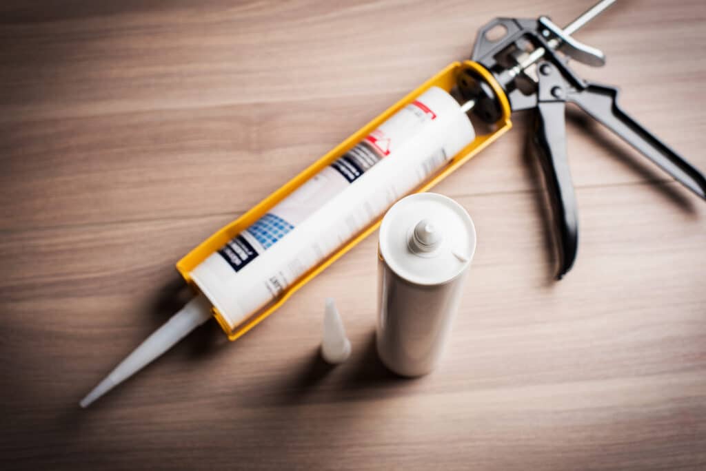 Caulk gun for air sealing