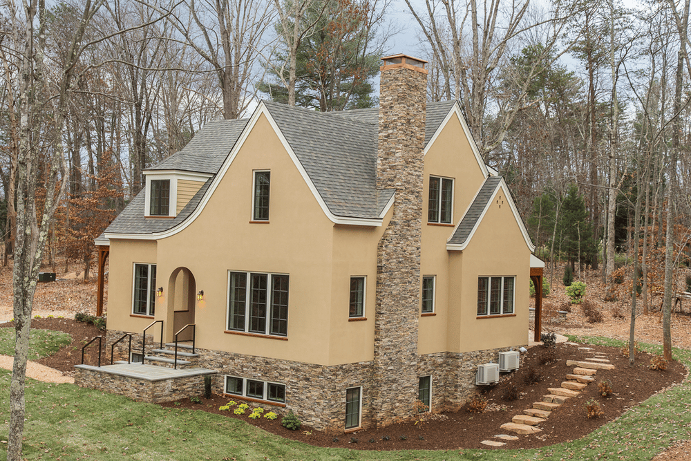 exterior of a house surrounded by trees