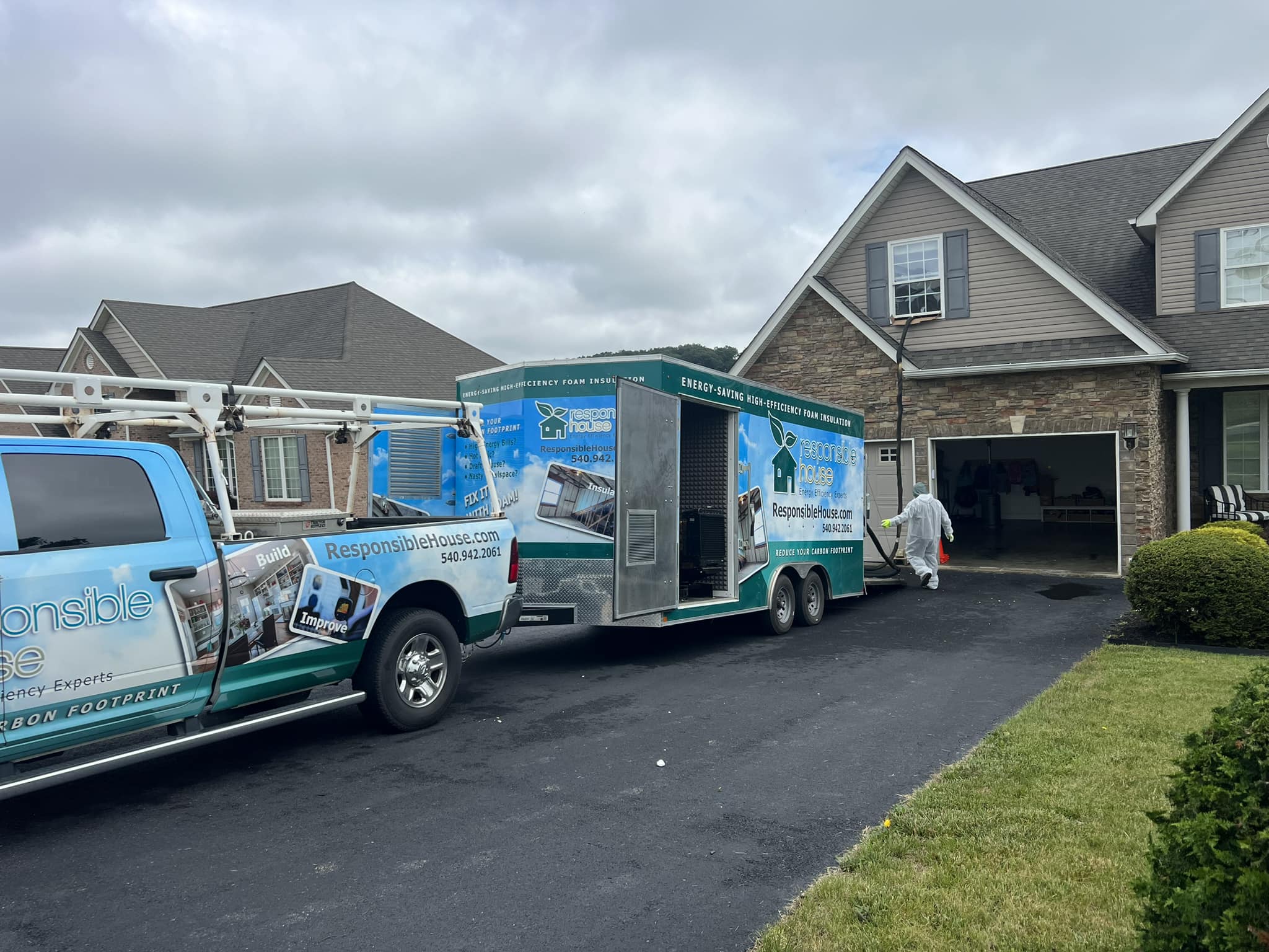 responsible house's trucks parked in a customer's driveway