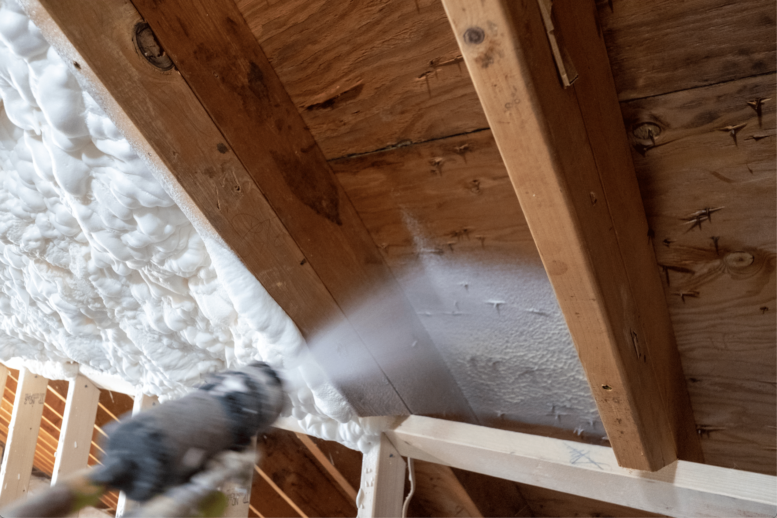 Putting Spray Foam in Attic